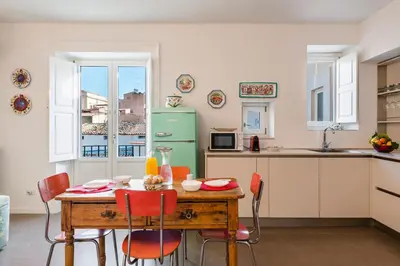 Cucina o angolo cottura di 2 Soru Ortigia Holiday Home - Romantico bilocale