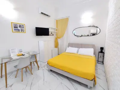 Letto o letti in una camera di La Casa di Dani e Marco vicino Ortigia, Siracusa