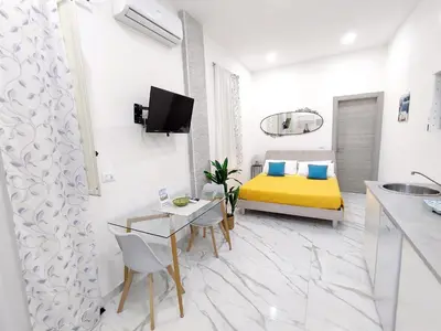 Letto o letti in una camera di La Casa di Dani e Marco vicino Ortigia, Siracusa