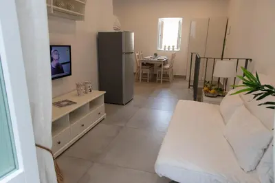 TV o dispositivi per l'intrattenimento presso Le Grazie Romantic House by Dimore Trinacria