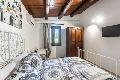 Letto o letti in una camera di Rifugio del Sole