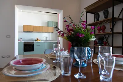 Cucina o angolo cottura di Le Maree Deluxe Apartment by Dimore Trinacria