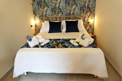 Letto o letti in una camera di Sophia Apartments