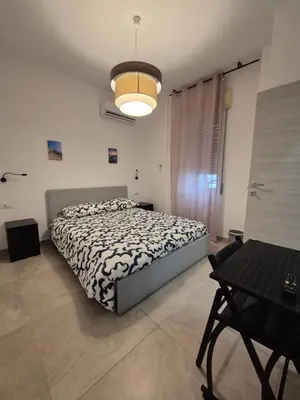 Letto o letti in una camera di Sicily Neapolis Apartment & Rooms