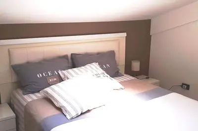 Letto o letti in una camera di Esperienza Luxury fronte mare con piscina