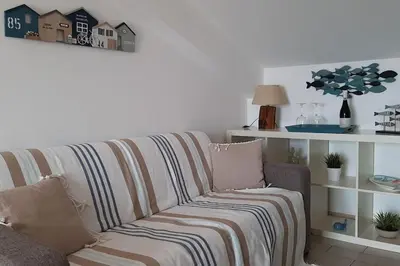 Area soggiorno di Esperienza Luxury fronte mare con piscina
