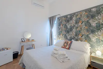 Letto o letti in una camera di La Mora Affittacamere
