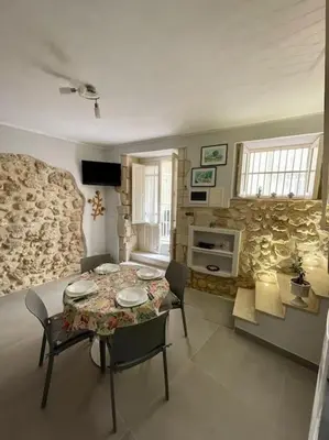 TV o dispositivi per l'intrattenimento presso Casa con terrazza in Ortigia
