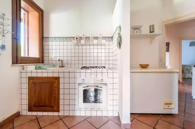 Cucina o angolo cottura di {Villa Jacuzzi Privata}sul mare di Fontane Bianche