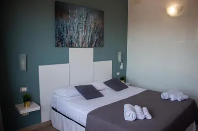 Letto o letti in una camera di Mirage Mer B&B