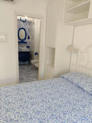 Letto o letti in una camera di il Nido Azzurro Marzamemi