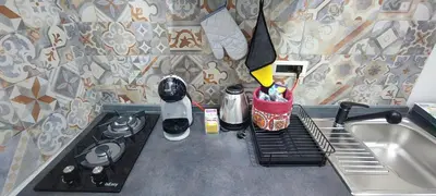 Cucina o angolo cottura di TAPIA'S ROOMS BIG