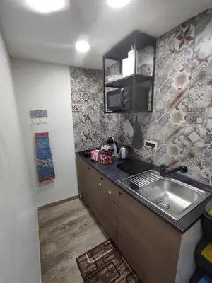 Cucina o angolo cottura di TAPIA'S ROOMS BIG