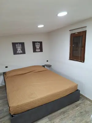 Letto o letti in una camera di TAPIA'S ROOMS BIG
