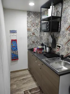 Cucina o angolo cottura di TAPIA'S ROOMS BIG
