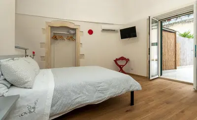 Letto o letti in una camera di Terrazza Campailla