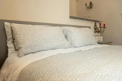Letto o letti in una camera di Terrazza Campailla