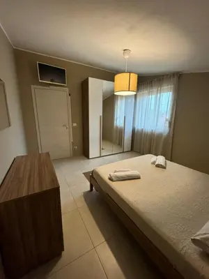 Letto o letti in una camera di Marina sea home