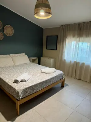 Letto o letti in una camera di Marina sea home