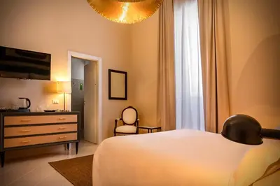 Letto o letti in una camera di Aria Rooms and Terrace