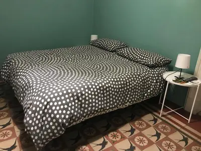 Letto o letti in una camera di reitano flat 1 by vacation flat catania