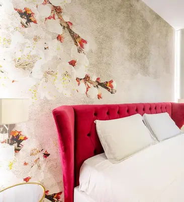 Letto o letti in una camera di MILLE SUITE GARDEN