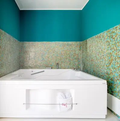 Letto o letti in una camera di MILLE SUITE GARDEN