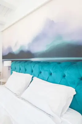 Letto o letti in una camera di MILLE SUITE GARDEN