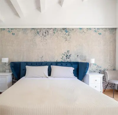 Letto o letti in una camera di MILLE SUITE GARDEN
