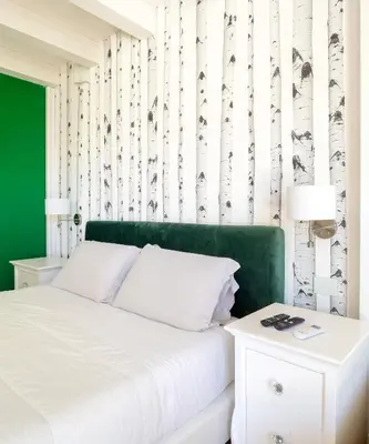 Letto o letti in una camera di MILLE SUITE GARDEN