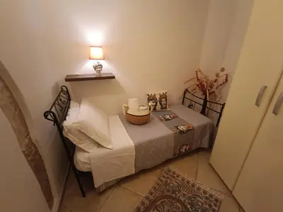Letto o letti in una camera di Cuore e Mare Ortigia