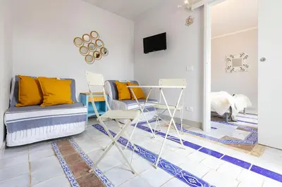 TV o dispositivi per l'intrattenimento presso Maison Bravè a due passi dal mare