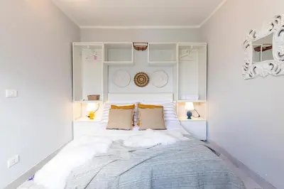 Letto o letti in una camera di Maison Bravè a due passi dal mare