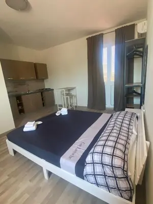 Letto o letti in una camera di Terrazza Mandalà