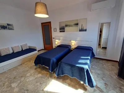 Letto o letti in una camera di Domus Theresa IV Vista Ortigia