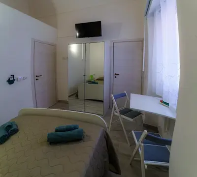 Area soggiorno di Casta Diva Holiday Rooms