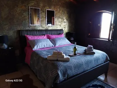 Letto o letti in una camera di Luxury b&b Le Rocce