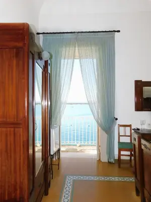 Letto o letti in una camera di Camere A’ Marina