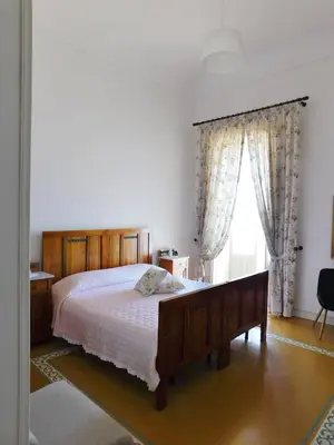 Letto o letti in una camera di Camere A’ Marina