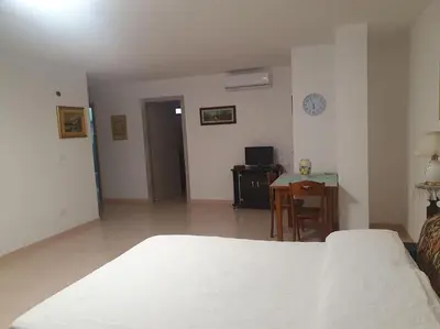Letto o letti in una camera di casa vacanza Nonna Lina