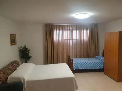 Letto o letti in una camera di casa vacanza Nonna Lina