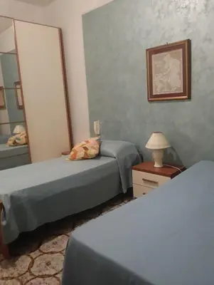 Letto o letti in una camera di Casa Akira Margot