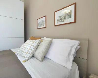 Letto o letti in una camera di Ciauru i mari - Elegante appartamento Ortigia