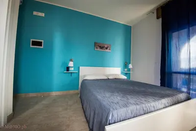 Letto o letti in una camera di Casa Caretta Caretta a San Lorenzo