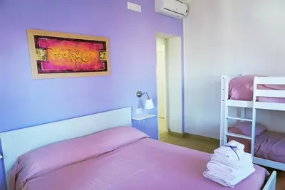 Letto o letti in una camera di Casa Caretta Caretta a San Lorenzo