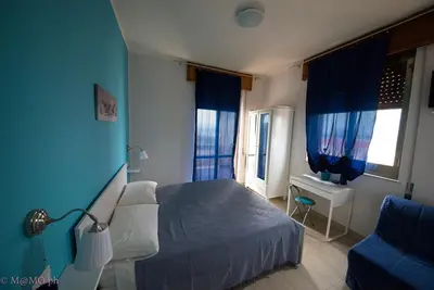 Letto o letti in una camera di Casa Caretta Caretta a San Lorenzo