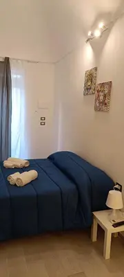 Letto o letti in una camera di Nel cuore di tutto