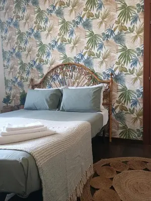 Letto o letti in una camera di A Casa di Alice