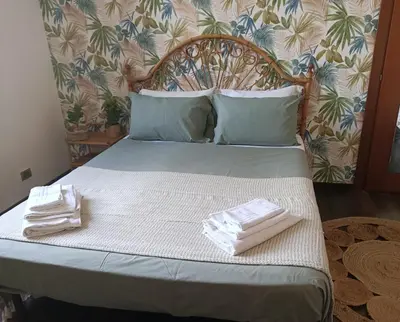 Letto o letti in una camera di A Casa di Alice