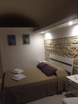 Letto o letti in una camera di House Garden Modica